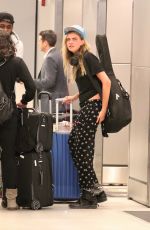 CARA DELEVINGNE and MICHELLE RODRIGUEA Arrives at Miami Airport