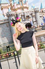 ELLE FANNING at Disneyland in Anaheim