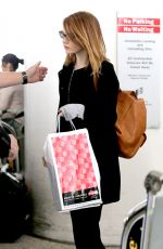 EMMA STONE Arrives at LAX Airport in Los Angeles