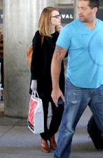 EMMA STONE Arrives at LAX Airport in Los Angeles