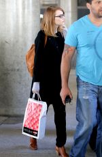 EMMA STONE Arrives at LAX Airport in Los Angeles