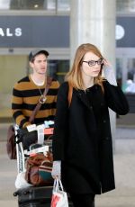EMMA STONE Arrives at LAX Airport in Los Angeles