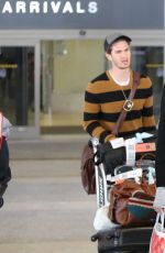 EMMA STONE Arrives at LAX Airport in Los Angeles
