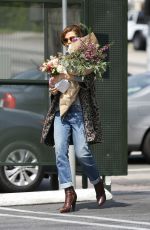 EVA MENDES Leaves My Secret Garden in Los Angeles