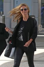 HEIDI KLUM at JFK Airport in New York