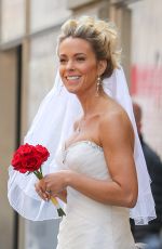 KATE GOSSELIN in Wedding Dress Promotes Brides for a Day in New York