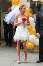 KATE GOSSELIN in Wedding Dress Promotes Brides for a Day in New York