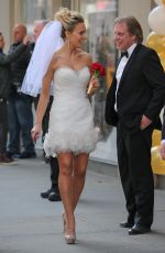 KATE GOSSELIN in Wedding Dress Promotes Brides for a Day in New York