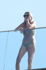 KATE MOSS in Bikini at a Hotel Pool in Rio De Janeiro