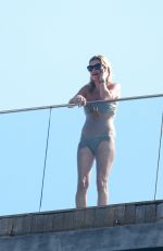 KATE MOSS in Bikini at a Hotel Pool in Rio De Janeiro