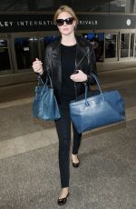 KATE UPTON Arrives at Los Angeles International Airport