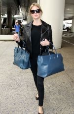 KATE UPTON Arrives at Los Angeles International Airport