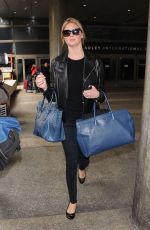 KATE UPTON Arrives at Los Angeles International Airport