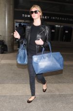 KATE UPTON Arrives at Los Angeles International Airport