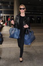 KATE UPTON Arrives at Los Angeles International Airport