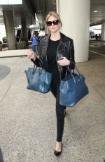 KATE UPTON Arrives at Los Angeles International Airport