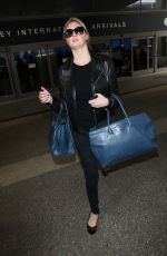 KATE UPTON Arrives at Los Angeles International Airport