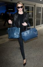 KATE UPTON Arrives at Los Angeles International Airport