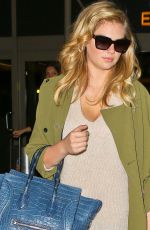 KATE UPTON at LAX Airport in Los Angeles 1304