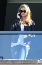 KATE UPTON in Jeans on a Hotel Balcony in Sydney