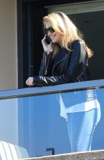 KATE UPTON in Jeans on a Hotel Balcony in Sydney