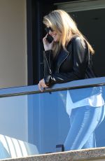 KATE UPTON in Jeans on a Hotel Balcony in Sydney