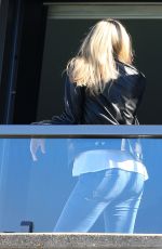 KATE UPTON in Jeans on a Hotel Balcony in Sydney