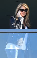 KATE UPTON in Jeans on a Hotel Balcony in Sydney