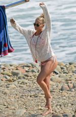 LEANN RIMES in Bikini Bottoms at a Beach in California