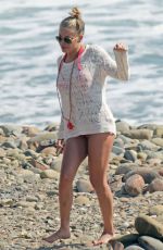 LEANN RIMES in Bikini Bottoms at a Beach in California