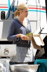 MAGGIE GRAC on the Set of Taken 3 in Los Angeles