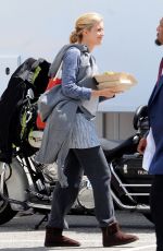 MAGGIE GRAC on the Set of Taken 3 in Los Angeles