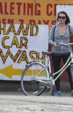 MARGOT ROBBIE Riding a Bike Out in London