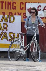MARGOT ROBBIE Riding a Bike Out in London