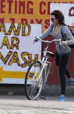 MARGOT ROBBIE Riding a Bike Out in London