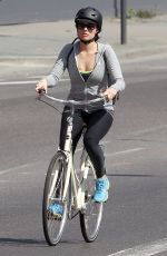 MARGOT ROBBIE Riding a Bike Out in London