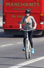 MARGOT ROBBIE Riding a Bike Out in London