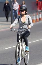 MARGOT ROBBIE Riding a Bike Out in London