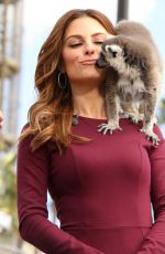 MARIA MENOUNOS on the Set of Extra in Los Angeles