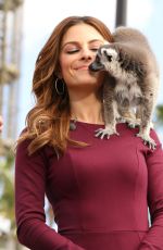 MARIA MENOUNOS on the Set of Extra in Los Angeles