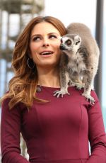 MARIA MENOUNOS on the Set of Extra in Los Angeles