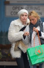 MILEY CYRUS Gets a New Dog While in New York