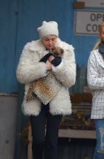 MILEY CYRUS Gets a New Dog While in New York
