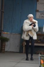 MILEY CYRUS Gets a New Dog While in New York