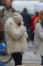 MILEY CYRUS Gets a New Dog While in New York