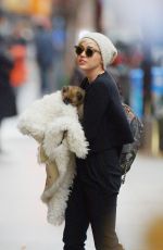 MILEY CYRUS Gets a New Dog While in New York
