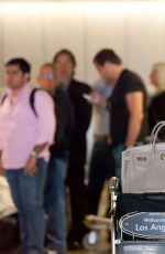 MISCHA BARTON at LAX Airport in Los Angeles