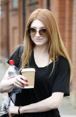 NICOLA ROBERTS Leaves a Recording Studio in London