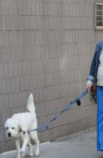 OLIVIA WILDE Walks Her Dog Out in New York