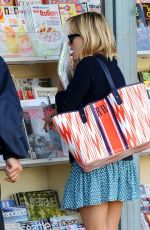 REESE WITHERSPOON in Skirt Buys Magazines in Brentwood